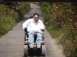 The Steven Webb in electric wheelchair