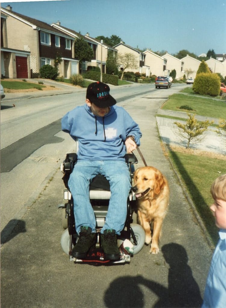 Steven Webb with his dogs for the disabled dog Ben